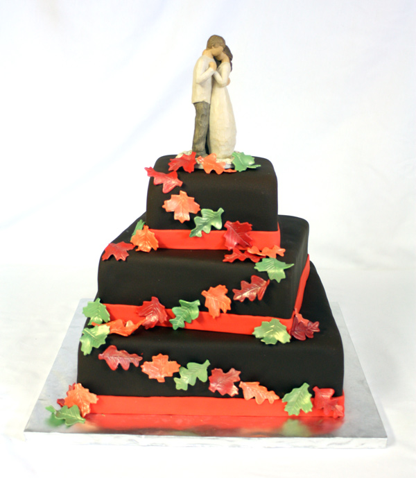 Chocolate wedding cake with leaves