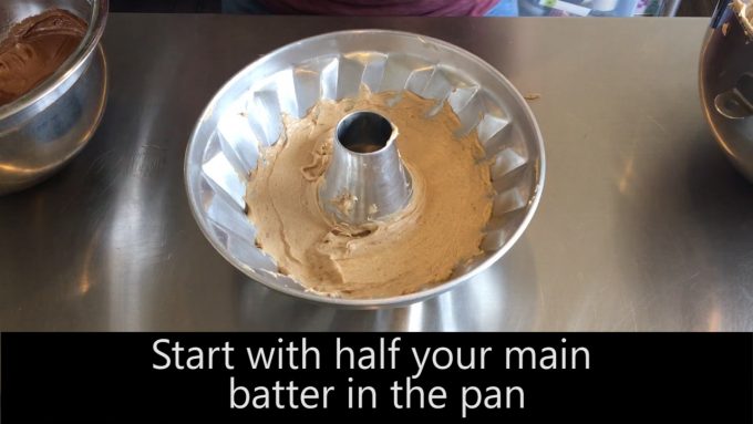 Start with half your main batter in the pan